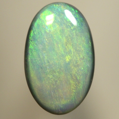 SOLID SEMI BLACK OPAL Even play of colour, orange and green over blue